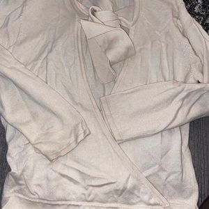 Tan sweater like material